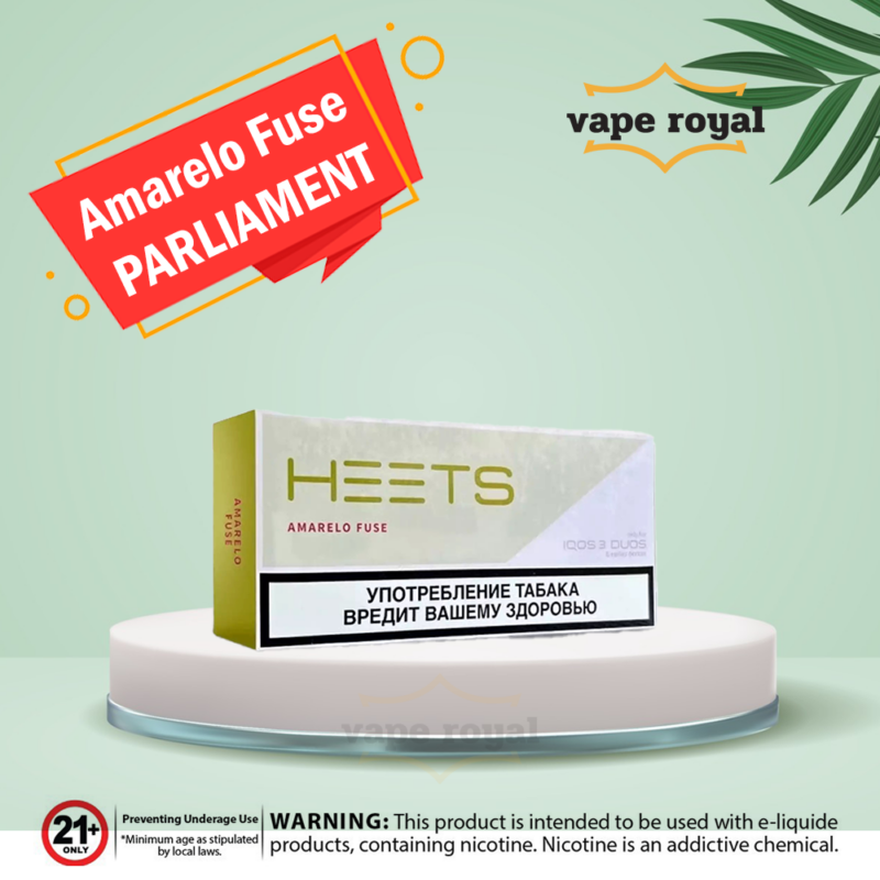 IQOS Heets Amarelo Fuse Parliament In Dubai IQOS Heets Parliament is a collection of tobacco sticks specially designed for IQOS devices, which are electronic devices that heat tobacco instead of burning it. This way, you can enjoy the taste and aroma of tobacco without the smoke, ash, or odor of conventional cigarettes. IQOS Heets Parliament is made in Russia under the supervision of Parliament Cigarettes, a well-known brand of premium tobacco products. IQOS Heets Parliament offers various flavors that cater to different preferences and moods. IQOS HEETS PARLIAMENT uses Heat-Not-Burn (HNB) technology, which heats specially designed tobacco sticks, called HEETS, to release the authentic taste of tobacco without the harmful byproducts associated with traditional smoking. As the tobacco is heated instead of burned, it eliminates ash production, making the experience ash-free and considerably less messy. With IQOS HEETS PARLIAMENT, you'll enjoy a full and rich tobacco flavor, free from the harshness and discomfort often associated with smoking. The absence of smoke means no second-hand smoke for those around you, creating a more considerate and clean environment for everyone.